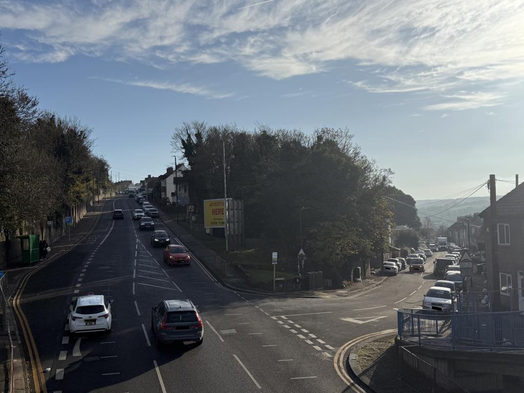 Lot: 75 - FREEHOLD SITE WITH POTENTIAL AND ADVERTISING HOARDING INCOME - View from Footbridge of land with Advertising Hoardings